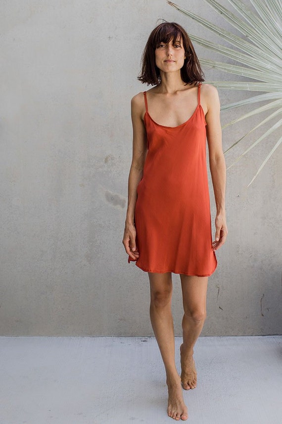 red silk slip dress