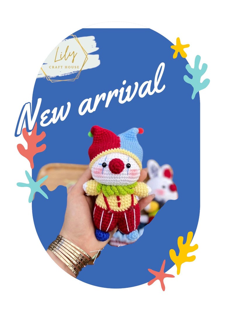 May include: A handmade crochet clown doll with a red, yellow, and blue color scheme. The doll has a white face with a red nose and is wearing a jester hat. The words "New arrival" are written in white cursive font.