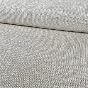 May include: Close-up of a rolled-up, light beige linen fabric. The fabric has a textured, woven appearance with visible threads. The neutral color and natural texture suggest a focus on textiles and home decor.