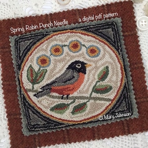 Puede incluir: Un diseño cuadrado de aguja de perforación hecho a mano con un petirrojo posado en una rama con hojas. El diseño está enmarcado dentro de un borde cuadrado e incluye el texto "Spring Robin Punch Needle a digital pdf pattern" y el nombre del artista. La paleta de colores incluye marrón, gris y naranja.