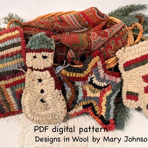 May include: Four punch needle ornaments featuring a striped stocking, a snowman, a star, and a mitten with a star motif. The text reads PDF digital pattern Designs in Wool by Mary Johnson. These textured fiber art pieces are displayed together.