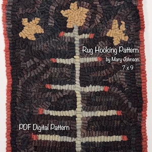 May include: A rectangular rug hooking pattern featuring a central tree design in light gray with red accents on a dark background, surrounded by three tan stars. The text reads Rug Hooking Pattern by Mary Johnson 7 x 9 and PDF Digital Pattern.