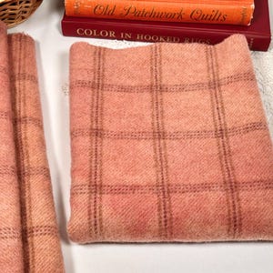 May include: A set of three ceramic mugs with a speckled, matte finish. The mugs are in shades of cream, light gray, and dark gray. Each mug has a simple, minimalist design, perfect for coffee or tea.