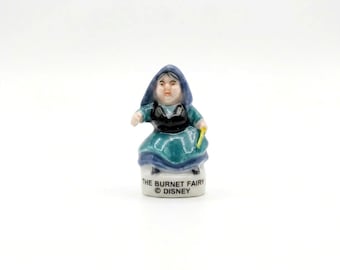 Porcelanowa figurka wróżki Burnet | Urok królewskiego ciasta | Kolekcjonerska miniatura zabytkowego domku dla lalek