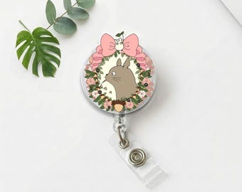 Porta-crachá retrátil com estampa floral de anime "Espírito da Floresta", em acrílico.