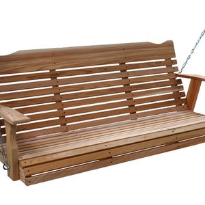 May include: A wooden porch swing with a slatted back and seat, and armrests. The swing is suspended by metal chains. The wood has a natural finish, and the design is classic and inviting. A perfect addition to any outdoor space.
