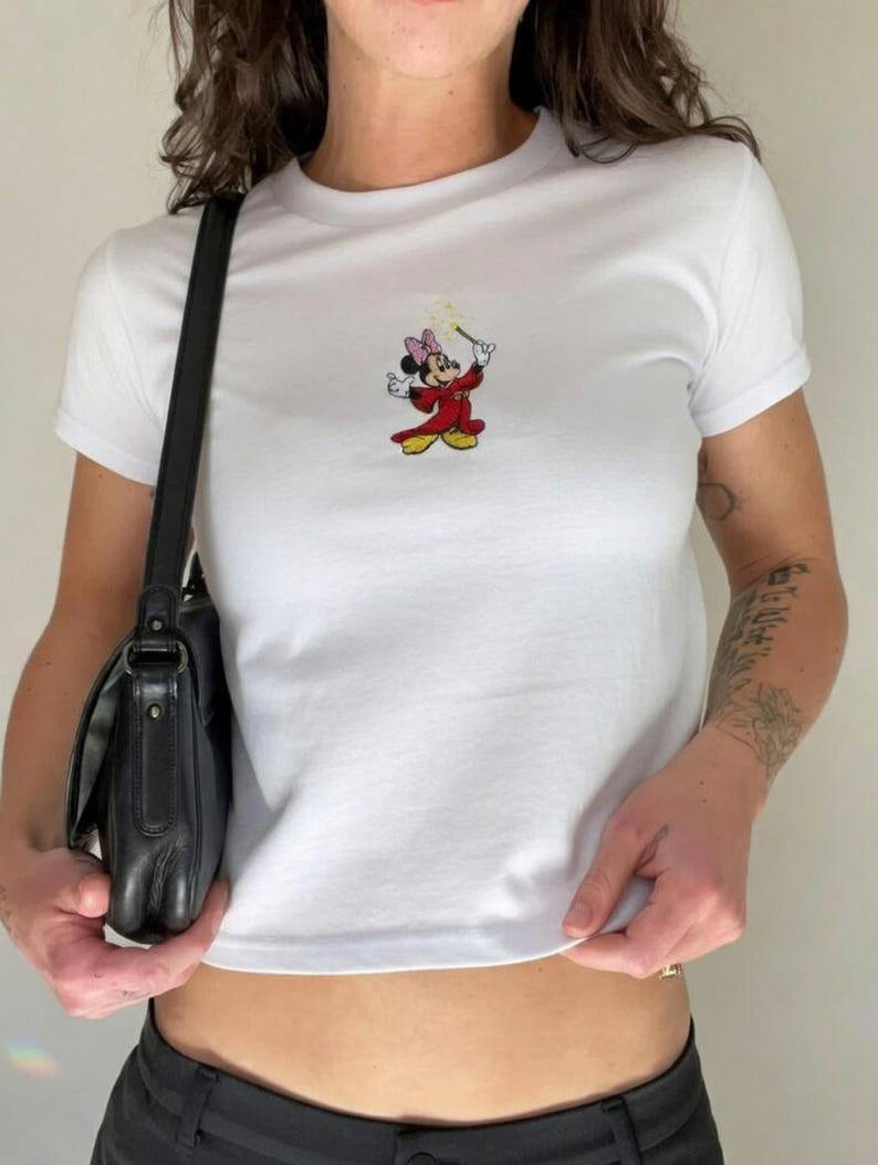 May include: A distressed wooden sign, inscribed with 'Welcome to our home' in white lettering. The sign has a rustic finish, ideal for a porch or hallway, creating a welcoming atmosphere.