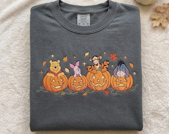 Geborduurd T-shirt met Winnie de Pooh en zijn vrienden in pompoenkleuren, Halloween T-shirt met magisch parkmotief, outfit voor een herfstvakantie met het gezin