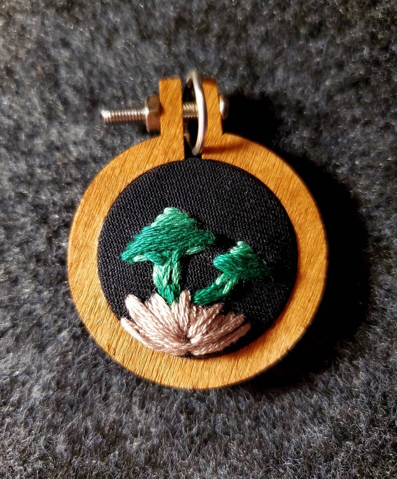 Hand embroidered mushroom pendant
