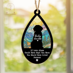 May include: A teardrop-shaped hanging ornament featuring a black silhouette of a dog against a stained-glass style landscape. The text reads Bailey, 2012-2026, and If Love Alone Could Have Kept You Here You Would Have Lived Forever, with a paw print.