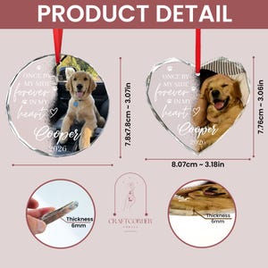 May include: Two clear acrylic ornaments, one circular and one heart-shaped, featuring a golden retriever photo, the text "ONCE BY MY SIDE, forever IN MY HEART", the name "Cooper", and the year "2026". Each ornament is 6mm thick with red ribbons.