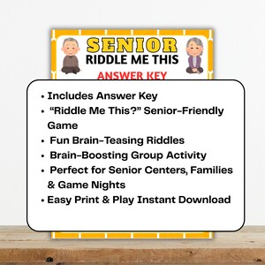 May include: A yellow sign with the text "SENIOR RIDDLE ME THIS ANSWER KEY" and a list of features. The sign includes cartoon illustrations of an elderly man and woman. The features include an answer key and fun riddles.