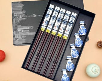 Juego de palillos hechos a mano, con un exquisito soporte tallado a mano, regalo especial de Año Nuevo.