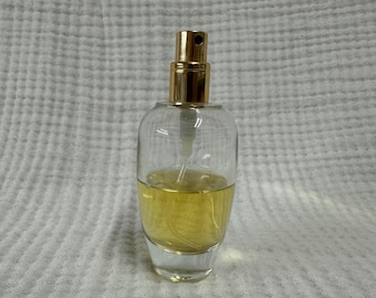 Vintage Coty Ghost Myst perfume 1.7 FL OZ bottle approximately 50% full