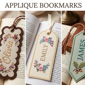 May include: Three embroidered applique bookmarks with the text APPLIQUE BOOKMARKS at the top. The first is beige with a brown scalloped edge, floral embroidery, and the name Olivia. The second is cream with floral embroidery and the name Emily. The third is sage green with oak leaf and acorn embroidery and the name James.