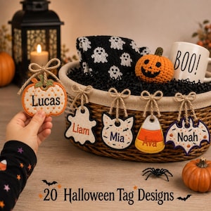 May include: A woven basket filled with black crinkle paper, a black and white ghost-patterned fabric, a crocheted orange pumpkin, and a white mug with the text BOO!. Five felt Halloween tags with names Lucas, Liam, Mia, Ava, and Noah.