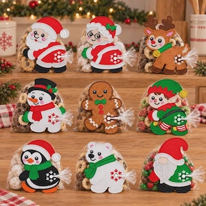 May include: Nine clear plastic bags filled with various snacks, each featuring a felt cutout of a holiday character including Santa, Mrs. Claus, a reindeer, a snowman, a gingerbread man, an elf, a penguin, a polar bear, and a gnome.