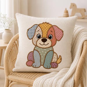 May include: A square off-white throw pillow featuring a central embroidered applique of a puppy. The puppy is composed of various fabric patches in blue gingham, yellow floral, pink polka dot, and green floral patterns with a dark brown nose.