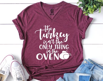 Thanksgiving pregnancy announcement shirt // the turkey isn't the only thing in the oven // cute fall pregnancy shirt // Unisex Tee