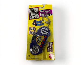 Llavero de juguete Micro Jammers Funky Rappin' de 1995, CAP Toys, nuevo, sellado, sin usar.