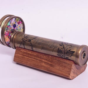 Kaleidoscope toy

Kids kaleidoscope

Educational kaleidoscope toy

Wooden kaleidoscope

Vintage kaleidoscope

Handmade kaleidoscope

Pocket kaleidoscope

Kaleidoscope gift for kids

Sensory toys for kids

Montessori optical toy