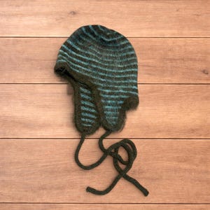 Vintage style knitted striped ear flap hat bonnet in green and brown.