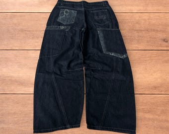 Incredible vintage style baggy wide leg skater fit jeans with leopard print in dark blue.
