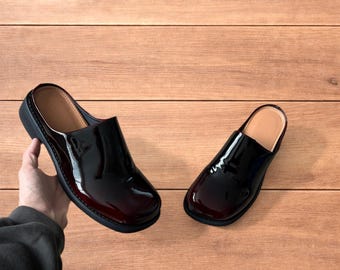 Lovely faux leather slip on clogs slippers in oxblood red.