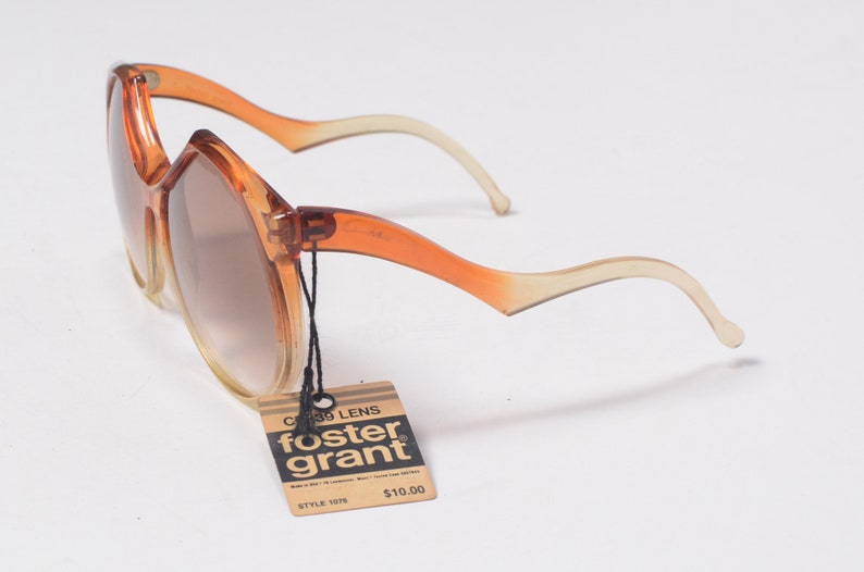 vintage 60s 70s sunglasses clear orange plastic frame brown tint lens Foster Grant oversize bug eye bugeye 1960 1970 fashion style NOS