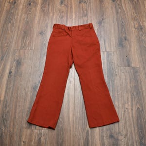 vintage 70s flare leg pants rust orange polyester trousers 32 waist 32x29