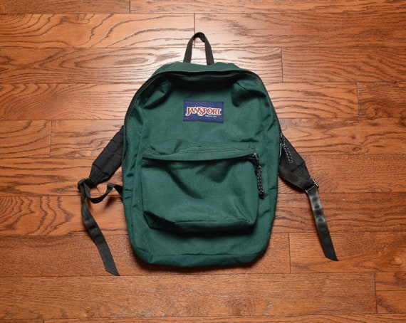 dark green jansport backpack