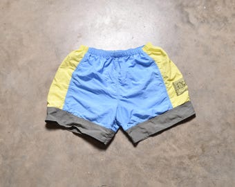 vintage 80s board shorts 1980 Stubbies Competitive Edge swim trunks blue yellow gray block bathing suit swimsuit 28-36 waist M medium