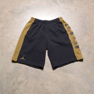 jordan shorts black and gold