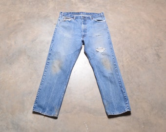 vintage 70s Levi's 505 jeans red tab Levis medium wash denim regular fit 36x29 36 waist tag size 38x30 distressed