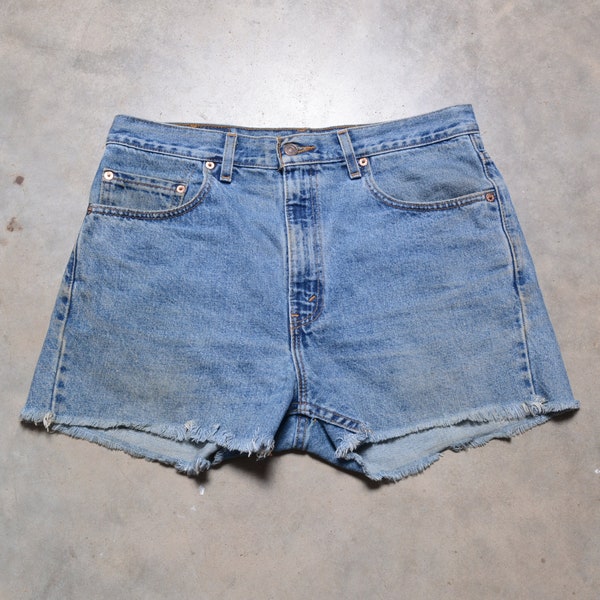 vintage 80s 90s Levi's 505 cutoff jean shorts denim medium wash red tab 1980 Levis 35 waist cut off