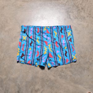 vintage 80s 90s board shorts 1980 1990 Ocean Patrol 44 swim trunks vector art XL XXL