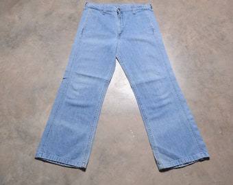 vintage 70s Levis 679 wide leg flare jeans orange tab 1970 vintage Levi's Movin' On Talon 42 zipper 32 waist medium wash denim