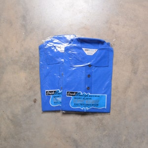 vintage knit shirt 60s 70s Grants Pennleigh short sleeve blue polo Ban-Lon 100% textured nylon 1960 1970 menswear M L NOS