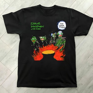 Camiseta negra Gildan Classic para fans de Shane MacGowan y The Popes: "El Crock of Gold"