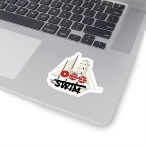 May include: A white sticker with a sailboat design, red accents, and the text "GEO SWIM" in black. The sticker is on a laptop.