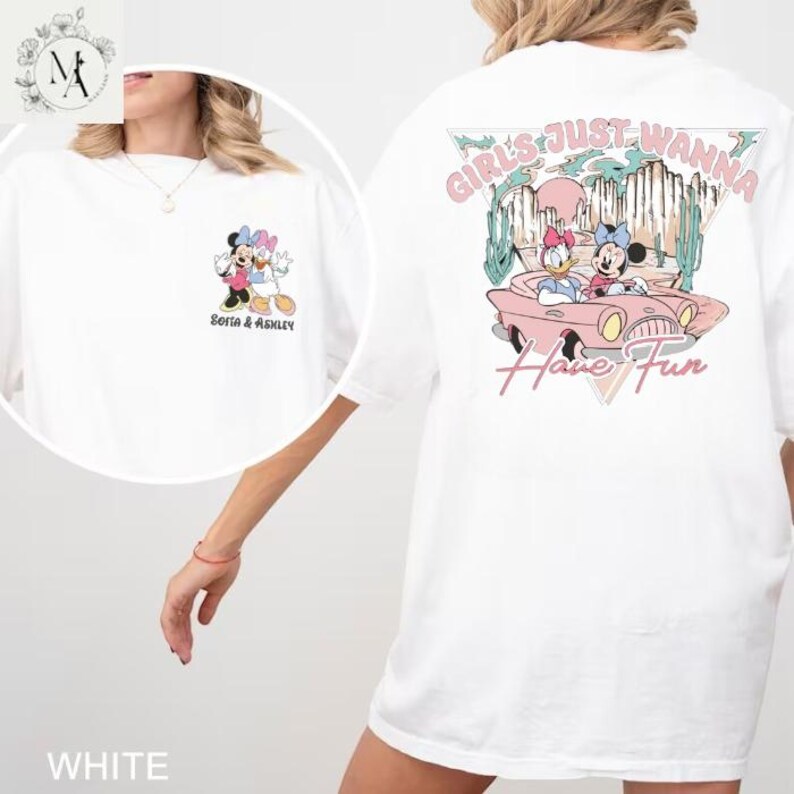 A white t-shirt with a graphic design featuring Minnie Mouse and the text "Girls Just Wanna Have Fun" printed on the back.