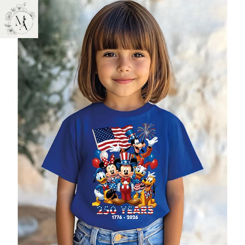 A young girl wearing a blue t-shirt with a graphic of Disney characters and the text "250 years 1776-2020" printed on it.
