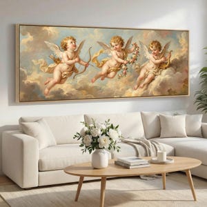 May include: A framed artwork depicting three cherubs with wings, set against a cloudy sky. One cherub holds a bow and arrow, another a floral garland, and the third plays a harp. The artwork has a warm colour palette.