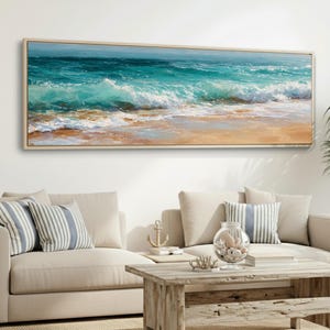 May include: A framed rectangular painting depicts a vibrant ocean scene. The artwork showcases turquoise waves crashing onto a sandy beach, with a light brown wooden frame. The painting evokes a sense of the sea.