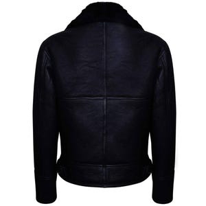 May include: Black leather jacket with a shearling collar. The back of the jacket is visible, showcasing the seams and the texture of the leather. The collar is a dark, contrasting color.