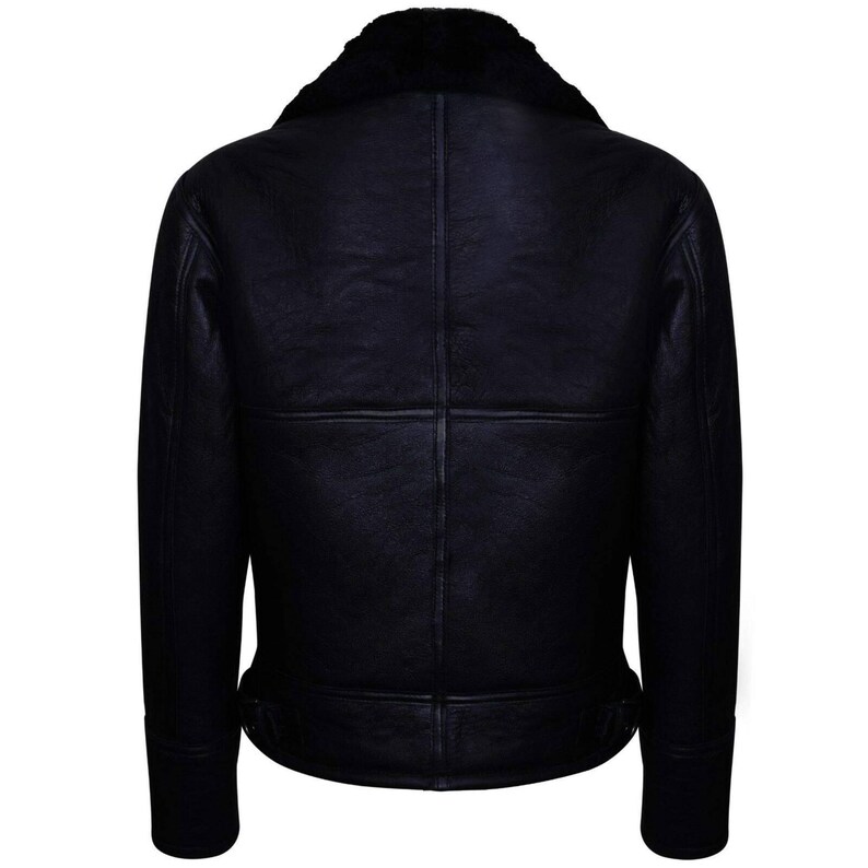 May include: Black leather jacket with a shearling collar. The back of the jacket is visible, showcasing the seams and the texture of the leather. The collar is a dark, contrasting color.