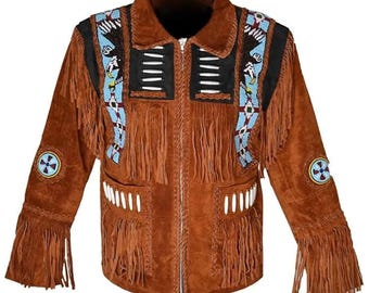 May include: Brown suede jacket with fringe detailing, a zipper closure, and decorative beadwork in blue, black, and white. The jacket features a collar and is adorned with circular patches on the sleeves.