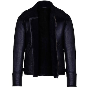 May include: A navy blue leather jacket with a shearling collar and lining. The jacket features a zip closure, side pockets, and adjustable cuffs. The jacket is a classic style, suitable for cold weather.