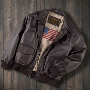 Chaqueta bomber de cuero genuino hecha a mano: estilo aviador con la bandera de EE. UU. de la Fuerza Aérea para hombre