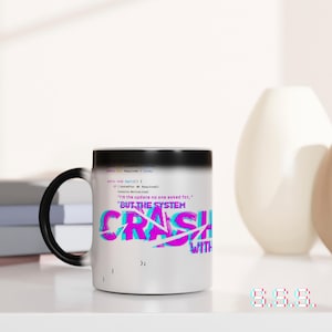 May include: A white ceramic mug with a black handle. The mug features the text "BUT THE SYSTEM CRASH WITH" in a glitch effect, with code snippets and the phrase "I'm the update no one asked for." The mug is on a white surface.